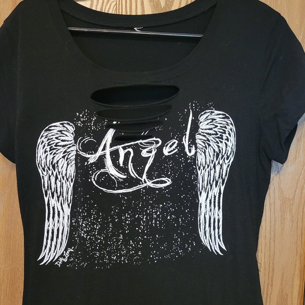 like new! Rocker type top with cut outs in front and back